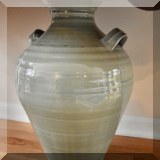 P02. Simon Pearce pottery vase with affixed glass top. 